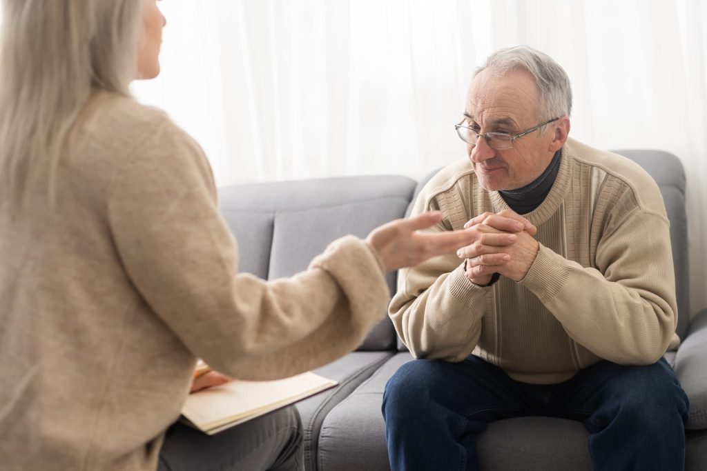 elderly man getting couselling